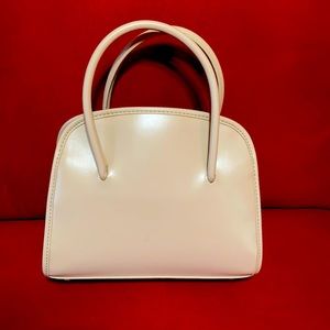 Tan purse that comes w/ extra body strap